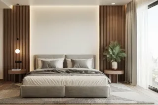 Une chambre moderne et élégante avec un lit gris, des accents en bois et une plante verte en pot près de la fenêtre.